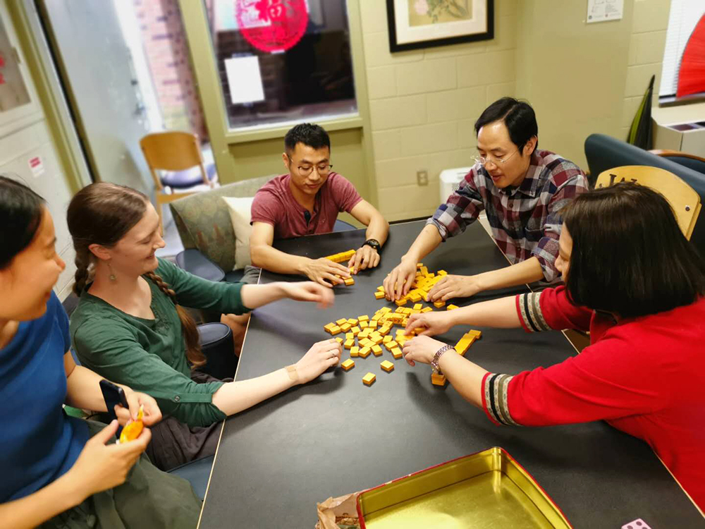 3. Players scramble the mahjong tiles and start a new game